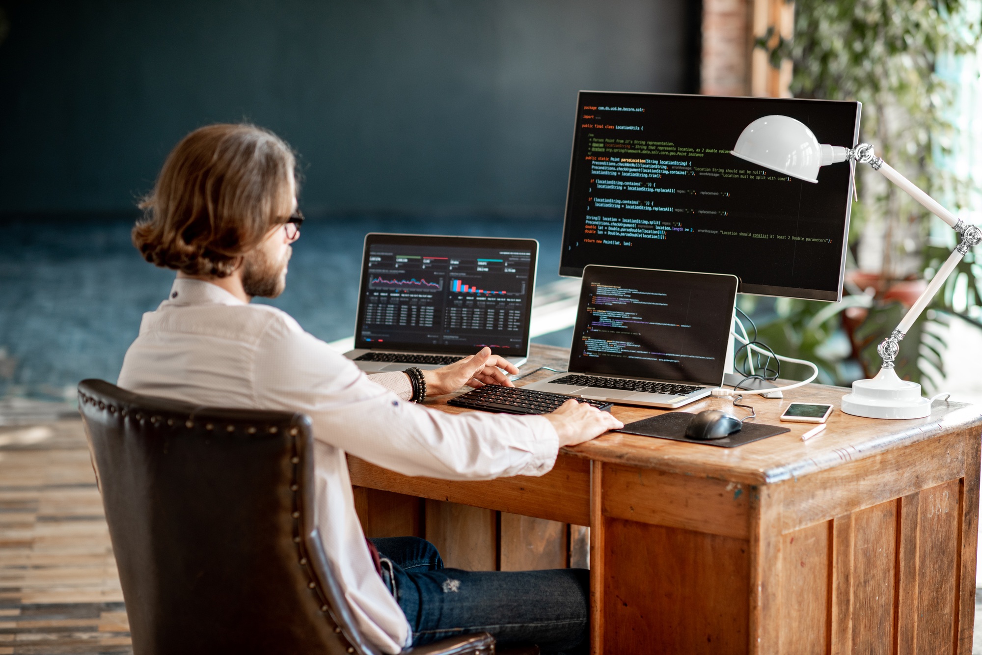 Programmer working with program code